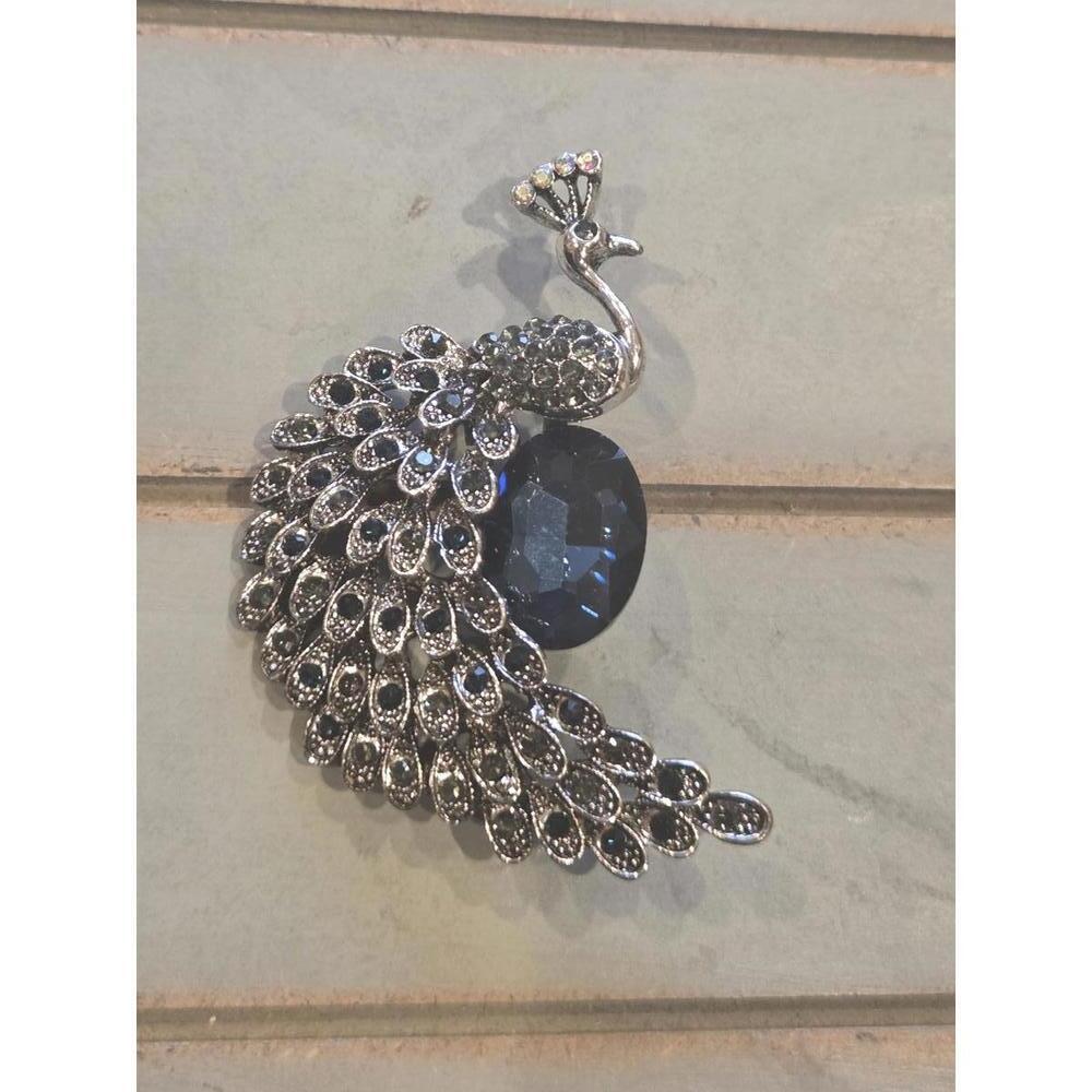Rhinestone jeweled peacock brooch